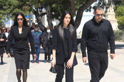 Relatives, friends and associates in Alexis Kougia's memorial